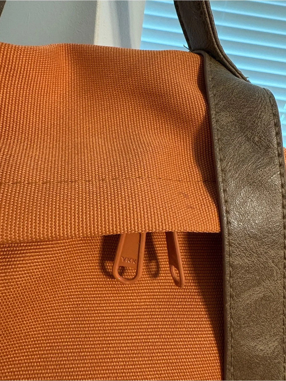Orange Canvas Backpack with Brown Accents